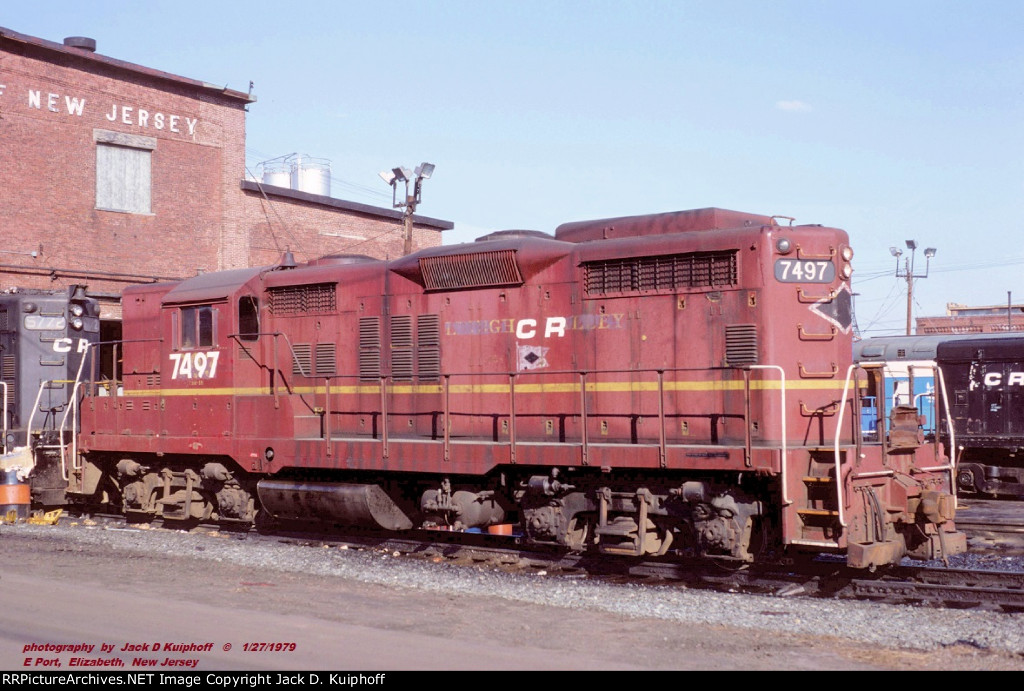 Conrail, CR 7497 ex-LV GP18, at the CNJ E.Port shops, Elizabeth, New Jersey. January 27, 1979. 